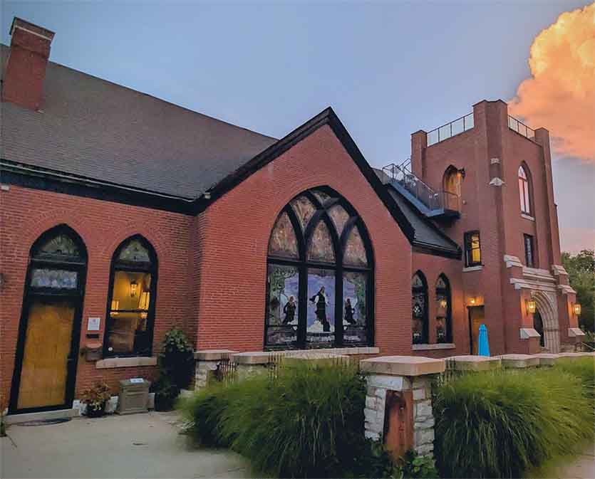 Gothic Heights Inn front quarter view near sunset