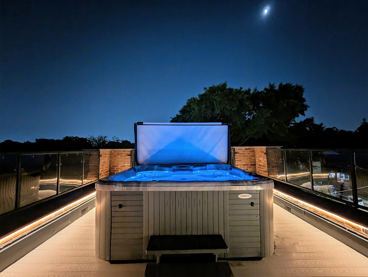 Gothic Heights Inn rooftop at night, perfect for Cardinals game weekends